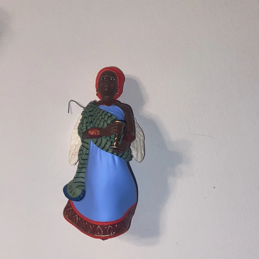 Vintage 1997 Hallmark Keepsake ornament from the A Celebration of Angels series.